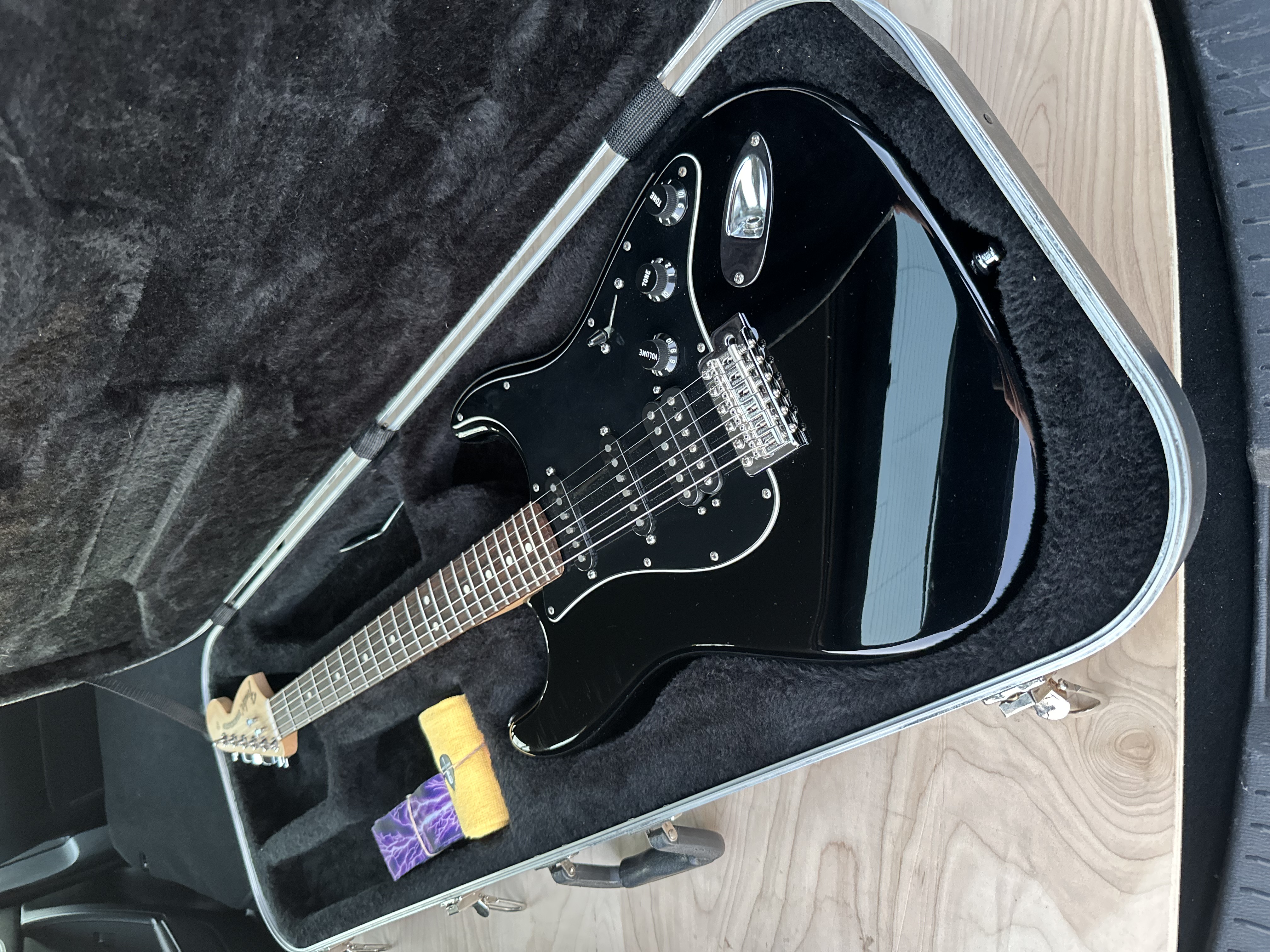 Black electric guitar